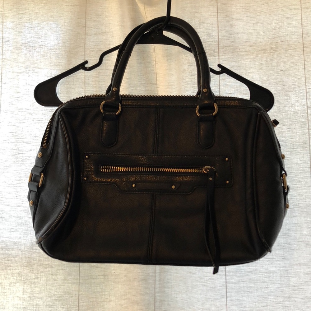 Black aldo purse with gold details.